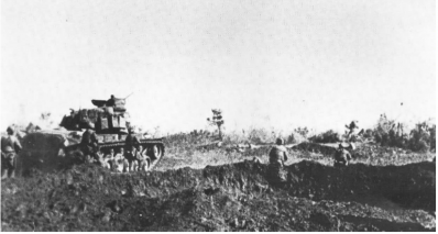 Buffalo marines of 3rd 9th moving behind tanks near con thien on 4 july